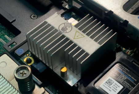 A close up of a motherboard with a cpu chip